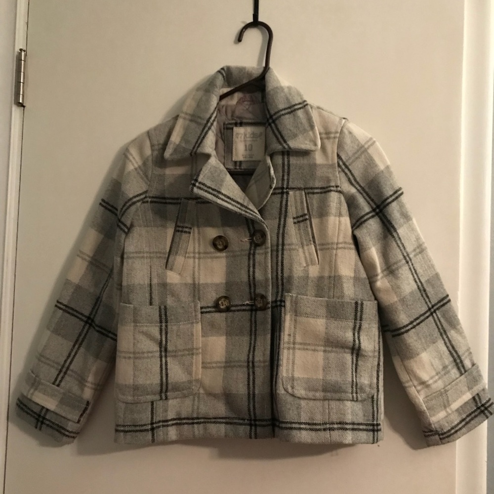White, gray, and black plaid pea coat